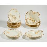 A Royal Crown Derby porcelain part-service, c.1893, green printed marks and date codes, decorated...