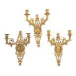 A pair of gilt-bronze twin-light wall appliques, of Empire style, second half 20th century, each ...