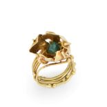 Ingeborg Bratman. A 14ct gold cat's eye tourmaline ring, of floral design, the cat's eye tourmali...