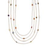 Two gem-set long chains, the first composed of spectacle set oval mixed-cut citrines, with figure...