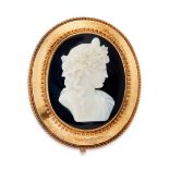 A late 19th century onyx cameo pendant/brooch, the onyx cameo depicting Bacchus, in profile, the ...