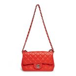 Chanel.  Classic Flap, of rouge pivione lambskin leather with silver-toned hardware, 2018, comes...