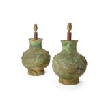 A pair of Chinese bronze archaistic vases, hu, mounted as lamps  20th century  The Han-style ve...