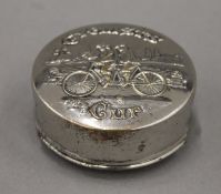 An Edwardian silver-plated embossed collapsible cyclist's cup. 6.5 cm diameter.