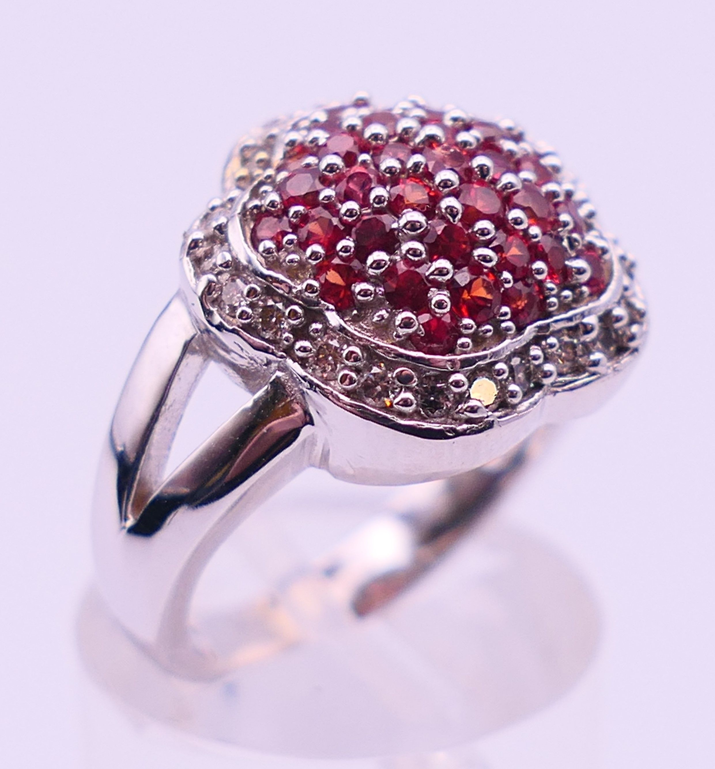 A 14 K white gold cluster ring. Ring size M. 8.1 grammes total weight. - Image 3 of 5