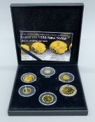 A cased set of gold-layered King Edward VIII 1936 strike pattern coins and various other coins.