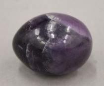 A fluorite mineral specimen of egg form. 5 cm high.