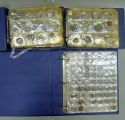 Three albums of various coins.