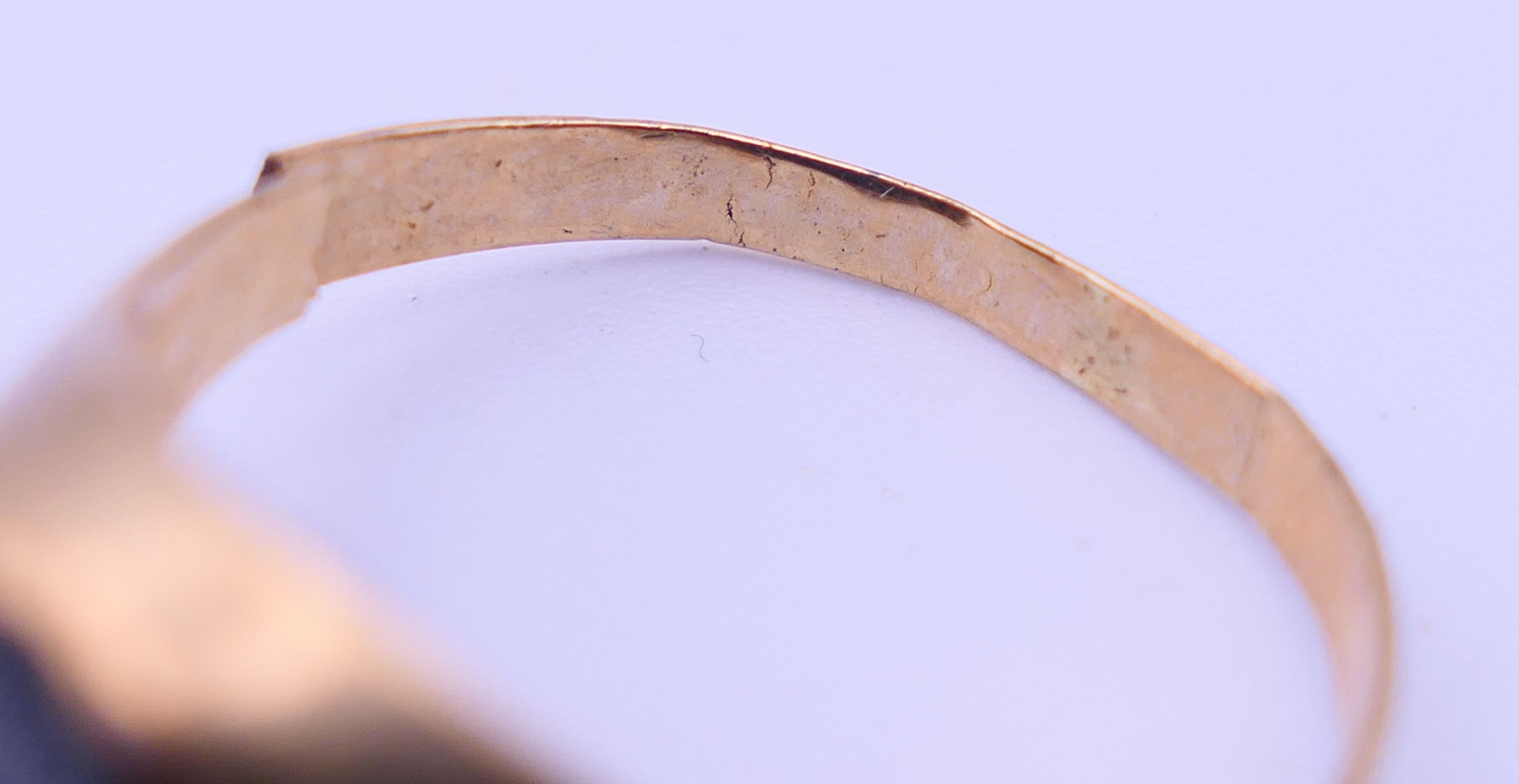 Two 9 ct gold rings, an unmarked gold signet ring and a pair of 9ct gold hoop earrings. - Image 16 of 19