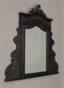 A Victorian ebonised overmantle mirror. 102 cm wide x 104 cm high.
