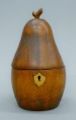 A wooden tea caddy formed as a pear. 18 cm high.