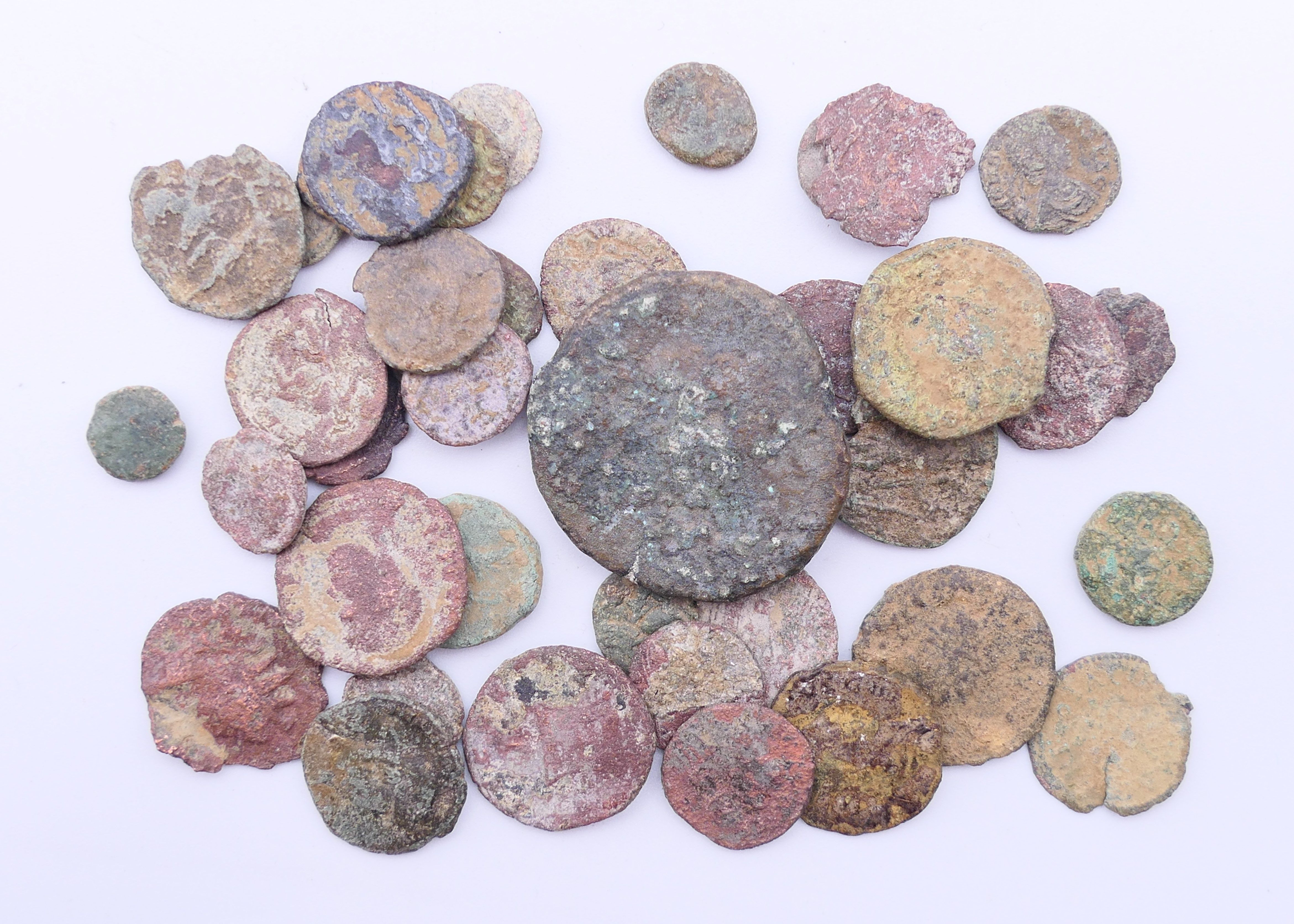 Forty various antiquity Roman coins.