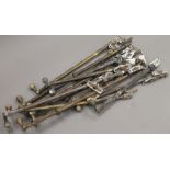 A quantity of brass Victorian window stays. The largest 48 cm long.