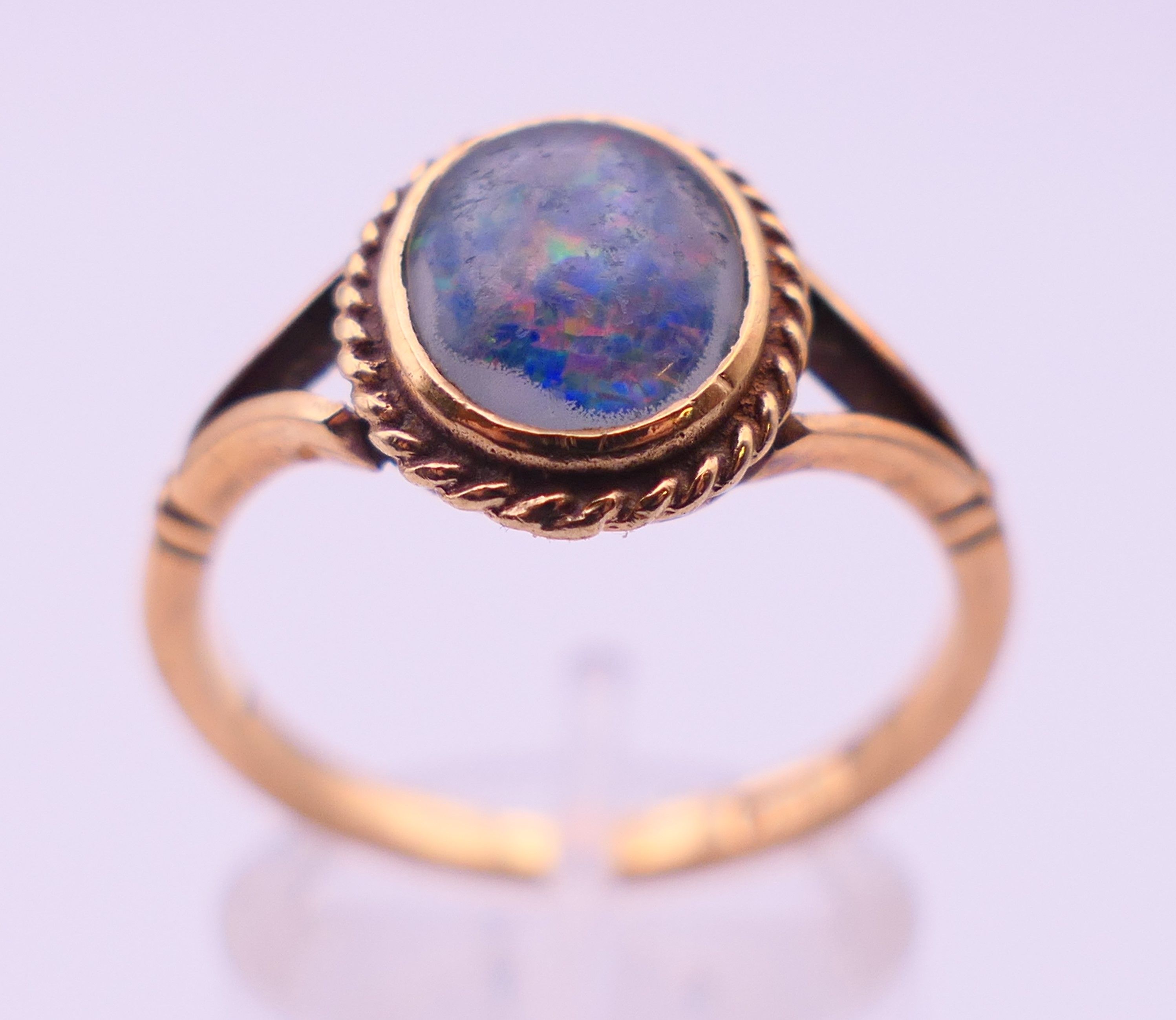 A 9 ct gold and black opal ring. Ring size T. 3.4 grammes total weight. - Image 2 of 5