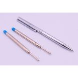 A Dupont ballpoint pen with two Rolex refills. Pen 13.5 cm long.
