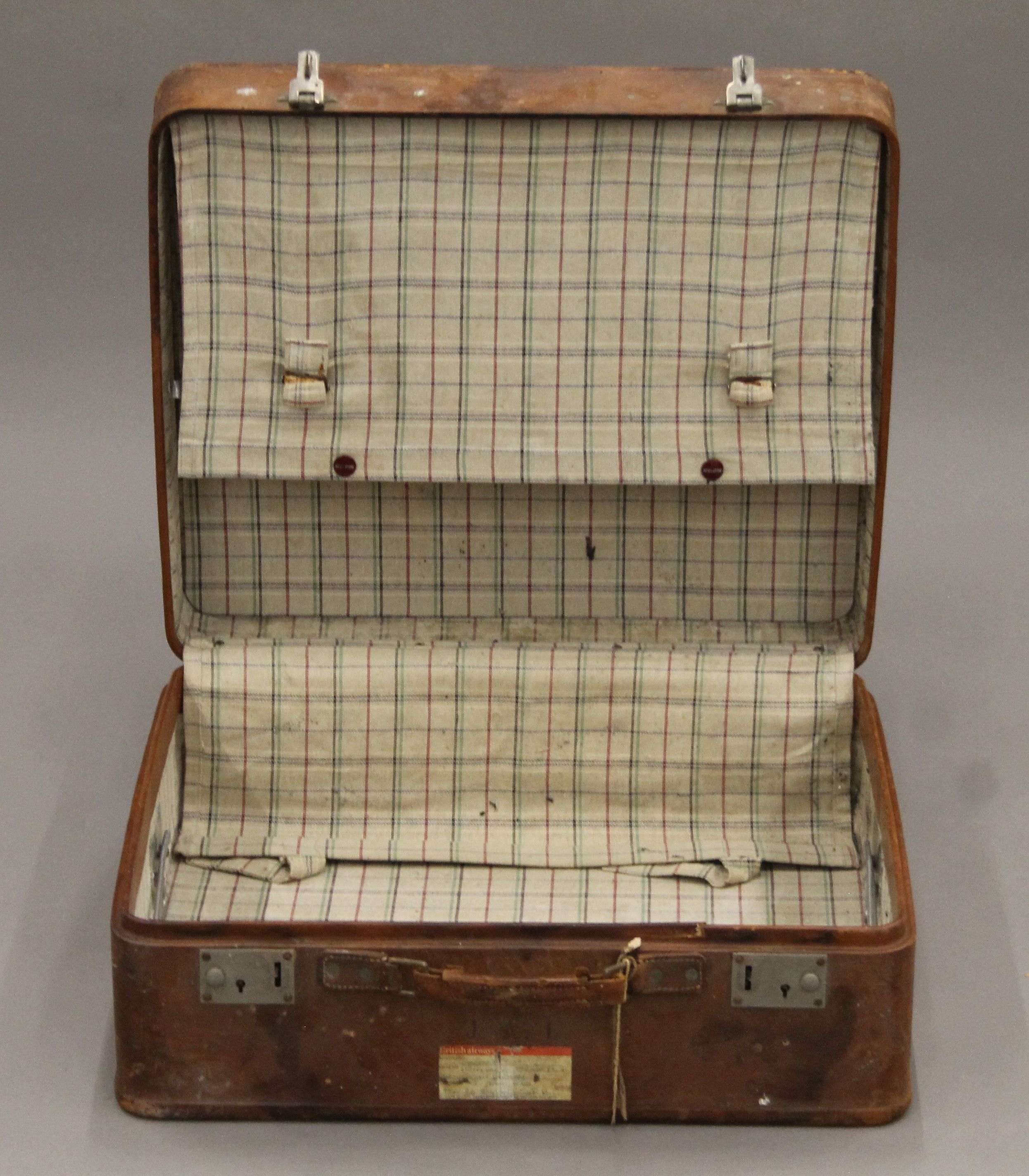 A vintage leather suitcase with some old travel labels. 55 cm wide. - Image 5 of 7