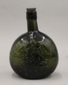 A Burgoyne wine growers' olive green glass bottle. 22 cm high.