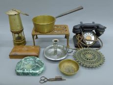 A quantity of miscellaneous items, including a vintage telephone, a miner's lamp etc.