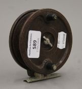 An Allcock Aerialite fishing reel. 9.5 cm diameter.