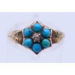 An unmarked antique 9 ct gold and turquoise ring. Ring size N. 1.4 grammes total weight.