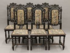 A set of six 19th century carved oak dining chairs. Each 45 cm wide.