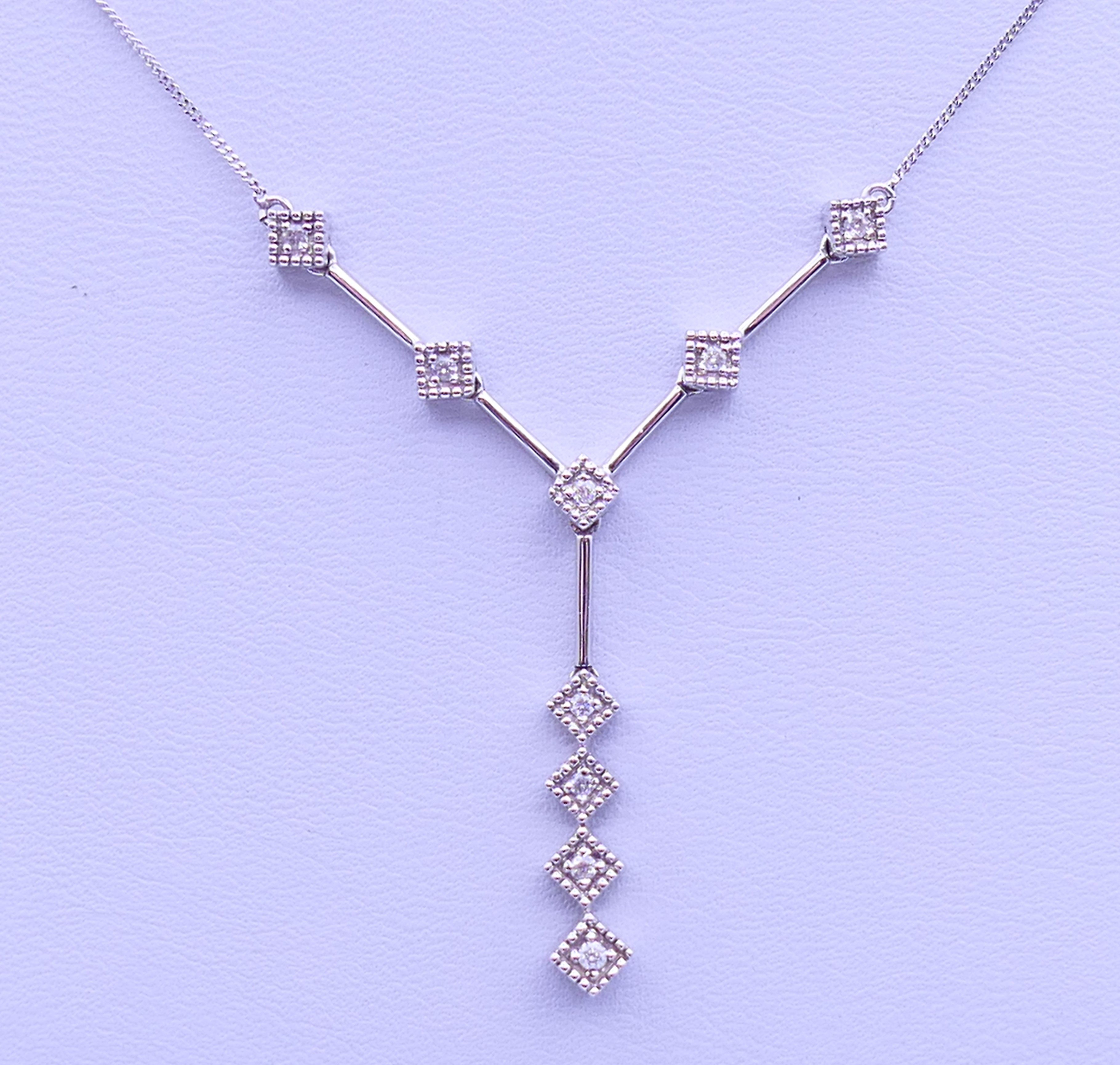 A 9 ct white gold and diamond pendant necklace. Pendant drop 3 cm high, chain 45 cm long. 3. - Image 2 of 8