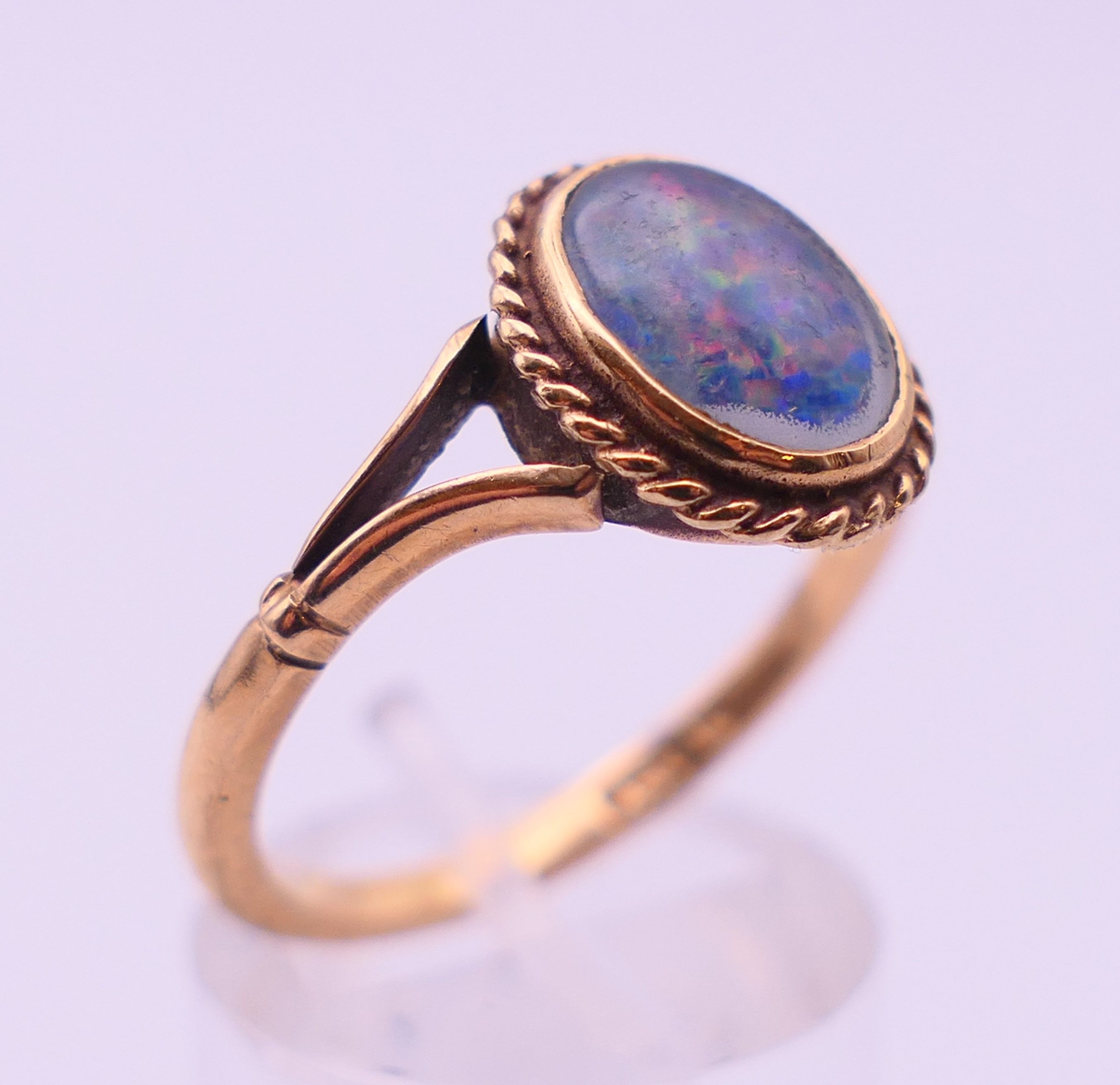 A 9 ct gold and black opal ring. Ring size T. 3.4 grammes total weight. - Image 3 of 5