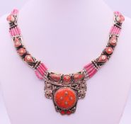 A Tibetan necklace. 40 cm long.