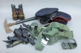 A British Chillington ARPAX axe, a WWII petty officer's cap, another military cap,