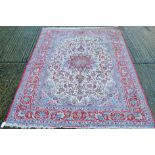 A Persian handmade Isfahan carpet. 240 x 162 cm.