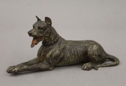 An Austrian cold-painted bronze model of a dog. 17.5 cm long.