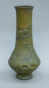 A 19th century Japanese bronze vase. 25 cm high.