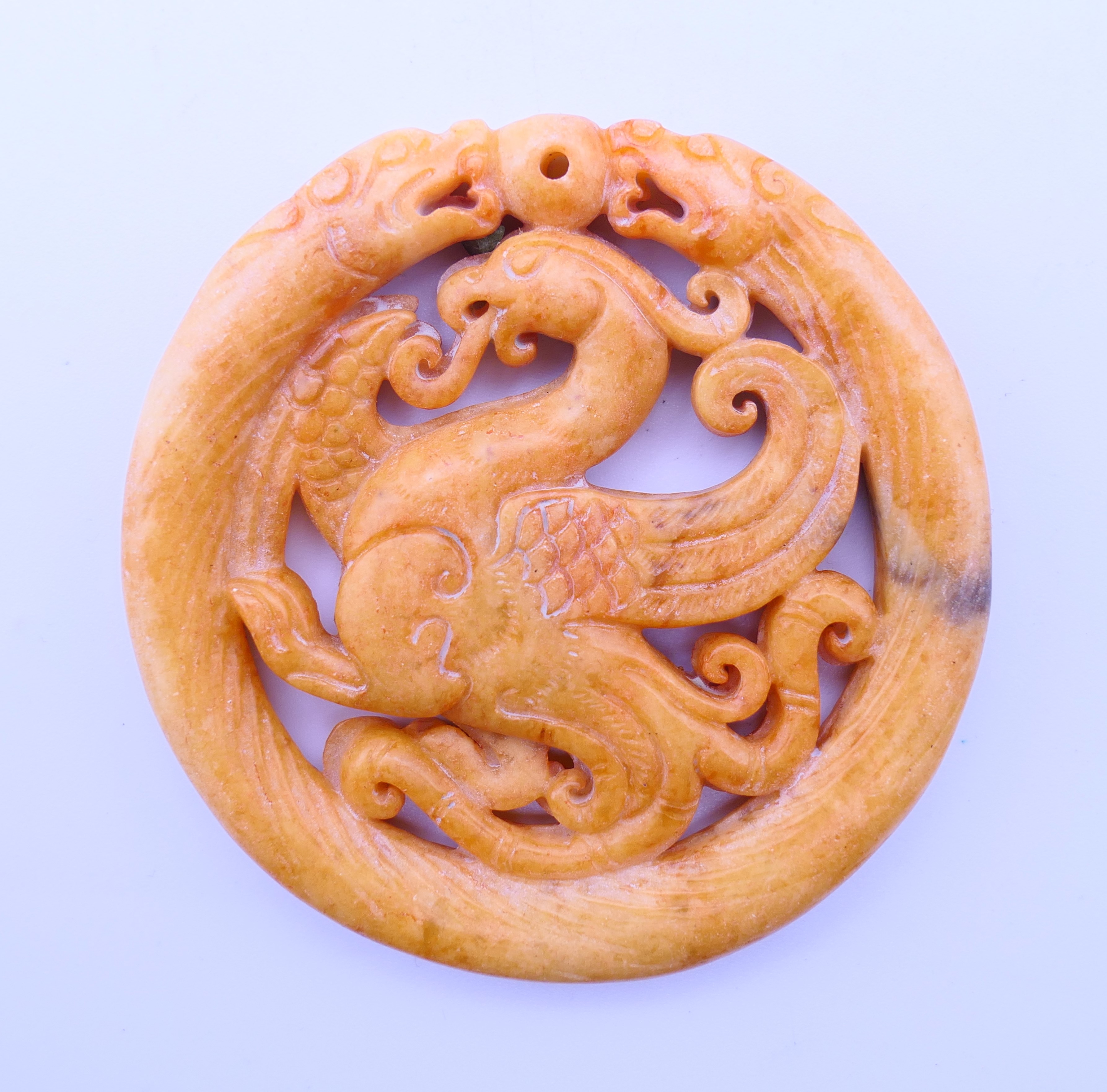 Three Chinese stone discs. The largest 7 cm diameter. - Image 4 of 10