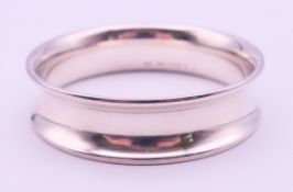 A Georg Jensen silver bangle. 6.25 cm diameter.