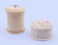 Two round bone boxes. The larger 4.5 cm high.