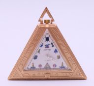 A silver gilt Masonic type pocket watch. 5 cm high.