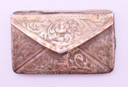 A silver envelope form stamp holder. 4.5 x 2.75 cm.