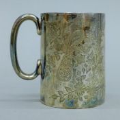 An embossed silver Christening mug. 8 cm high. 121.2 grammes.
