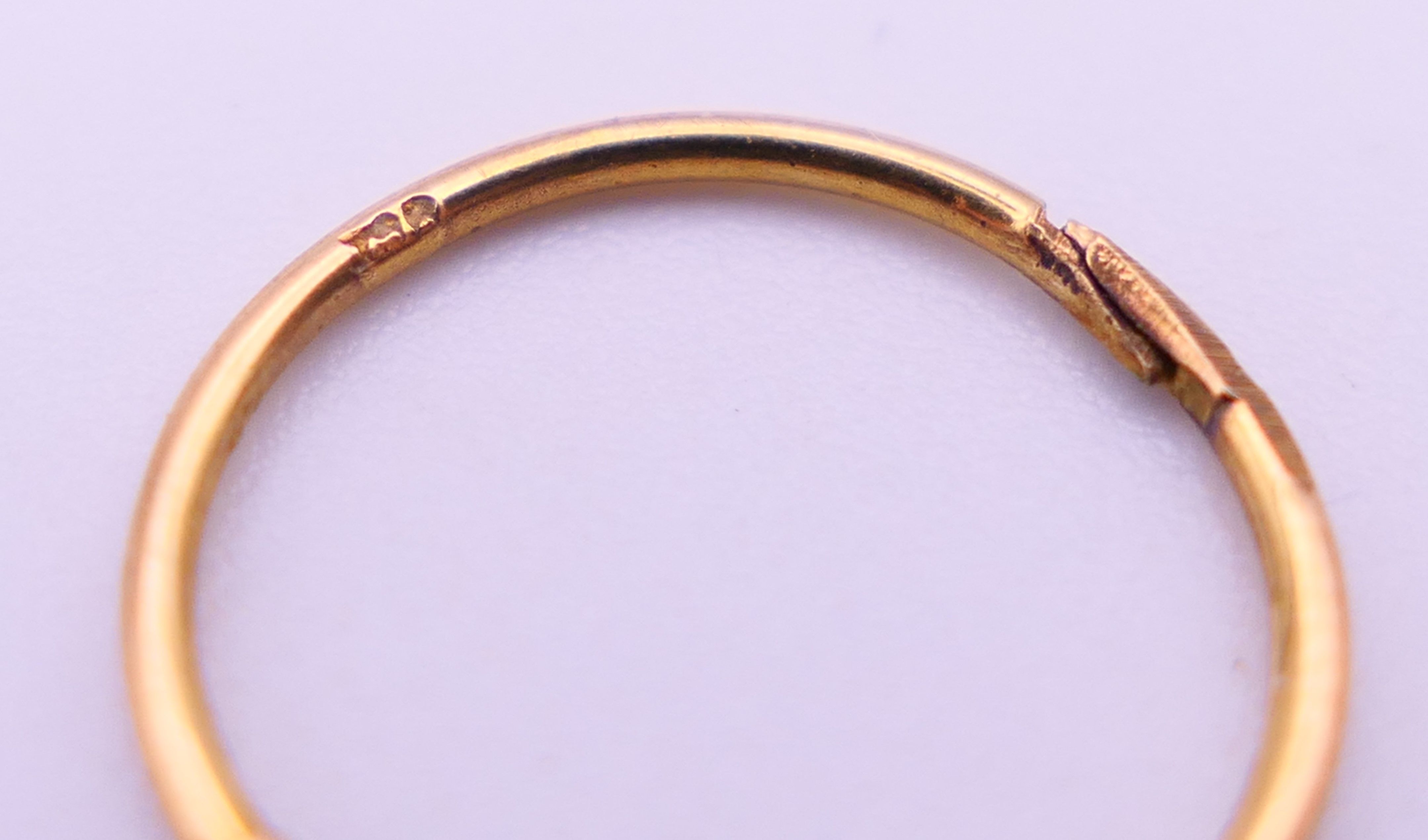 Two 9 ct gold rings, an unmarked gold signet ring and a pair of 9ct gold hoop earrings. - Image 19 of 19