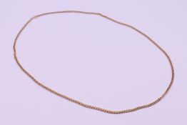 A 9 ct gold chain. 70 cm long. 19 grammes.