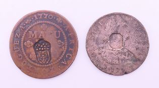 Two antique coins.