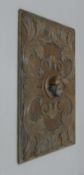 A 19th century carved oak panel, centred with a male bust. 31.5 x 47 cm.