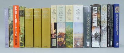 A quantity of books on military themes.