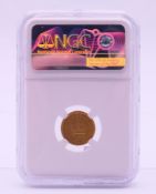 A slabbed George III 1810 one third gold Guinea coin.