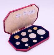 A cased 1902 specimen coin set - 1 pence coin to a sovereign. Case 18 x 11.5 cm.