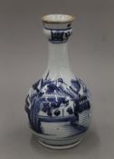 A 18th/19th century Chinese blue and white porcelain bottle vase. 22 cm high.