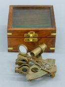 A boxed brass sextant. The box 11.5 cm wide.