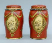 A pair of toleware tea tins. Each 17 cm high.