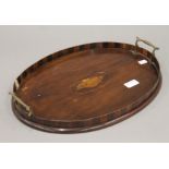 A small Victorian inlaid mahogany tray. 43 cm wide.