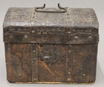 An 18th century leather and iron-bound casket. 26.5 cm wide.